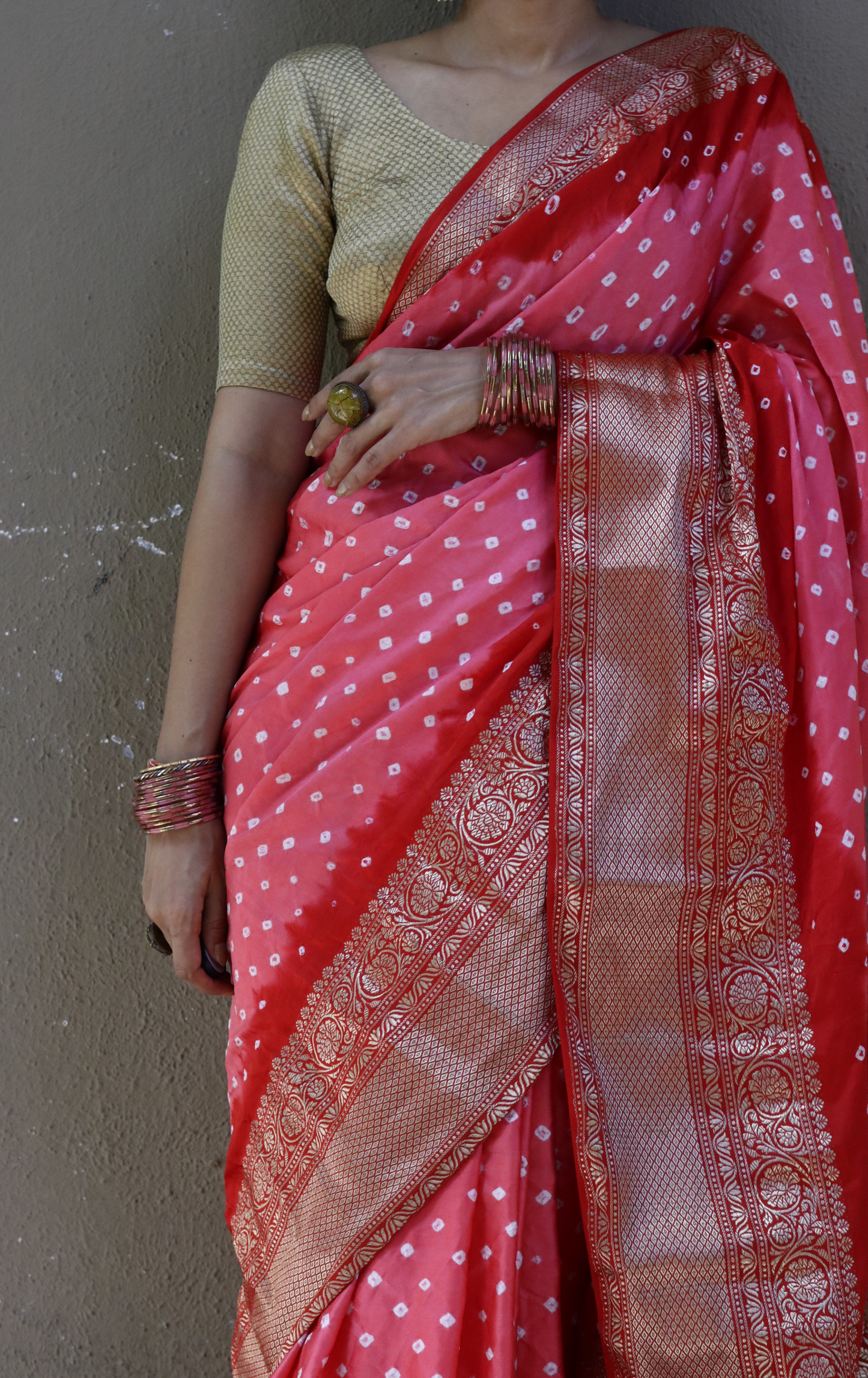 Buy Bandhani Designer Saree Online : Peach Red Bandhani Hand Dyed Saree With Gold Border